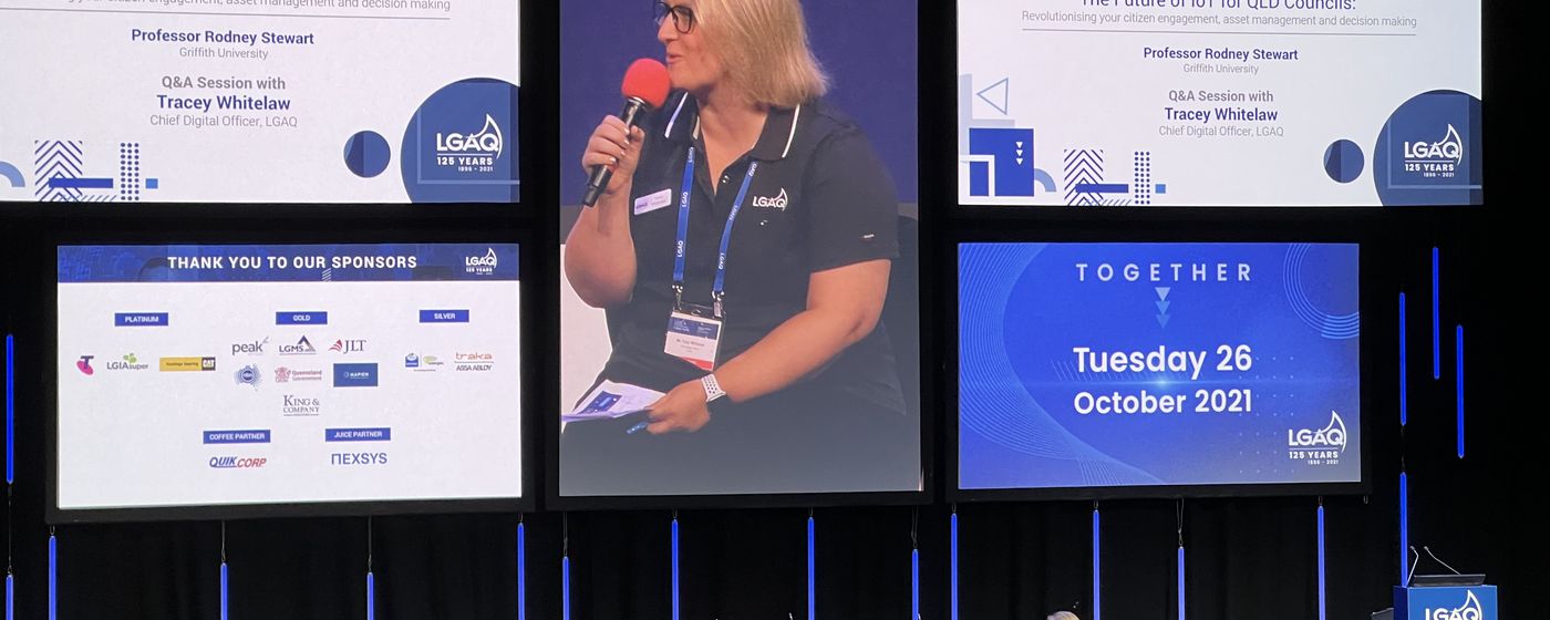On stage at an LGAQ conference